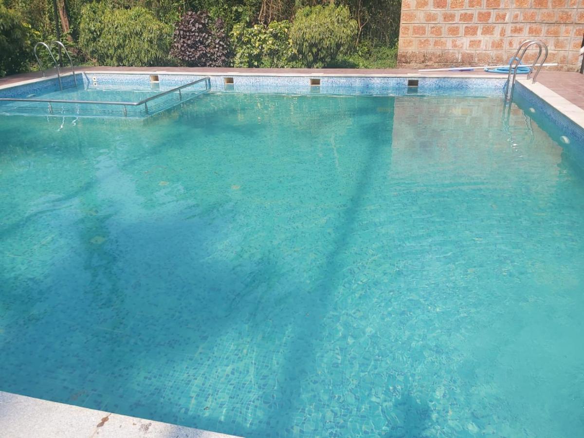 Ezzenza Areca Resort Madikeri Bagian luar foto